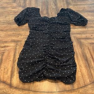 Short dress, form fitting, short sleeved, poka dot, black